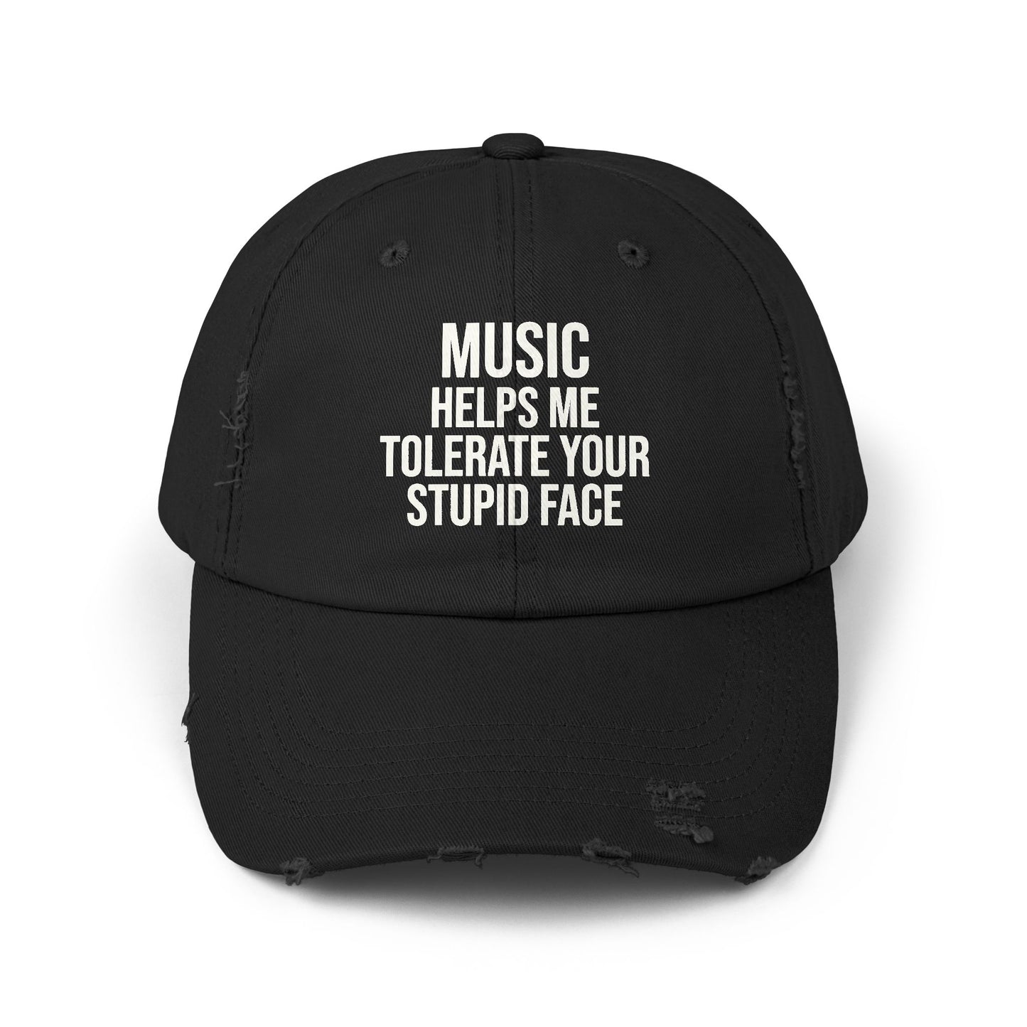 A black distressed baseball cap with white text on the front that reads 'MUSIC HELPS ME TOLERATE YOUR STUPID FACE'.