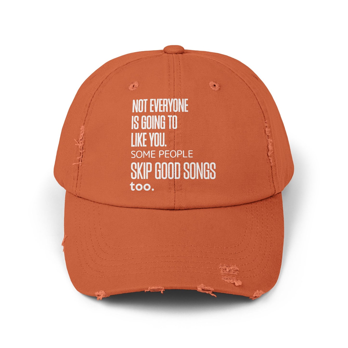 Burnt orange distressed dad cap featuring the music quote “Not Everyone Is Going to Like You. Some People Skip Good Songs Too.”