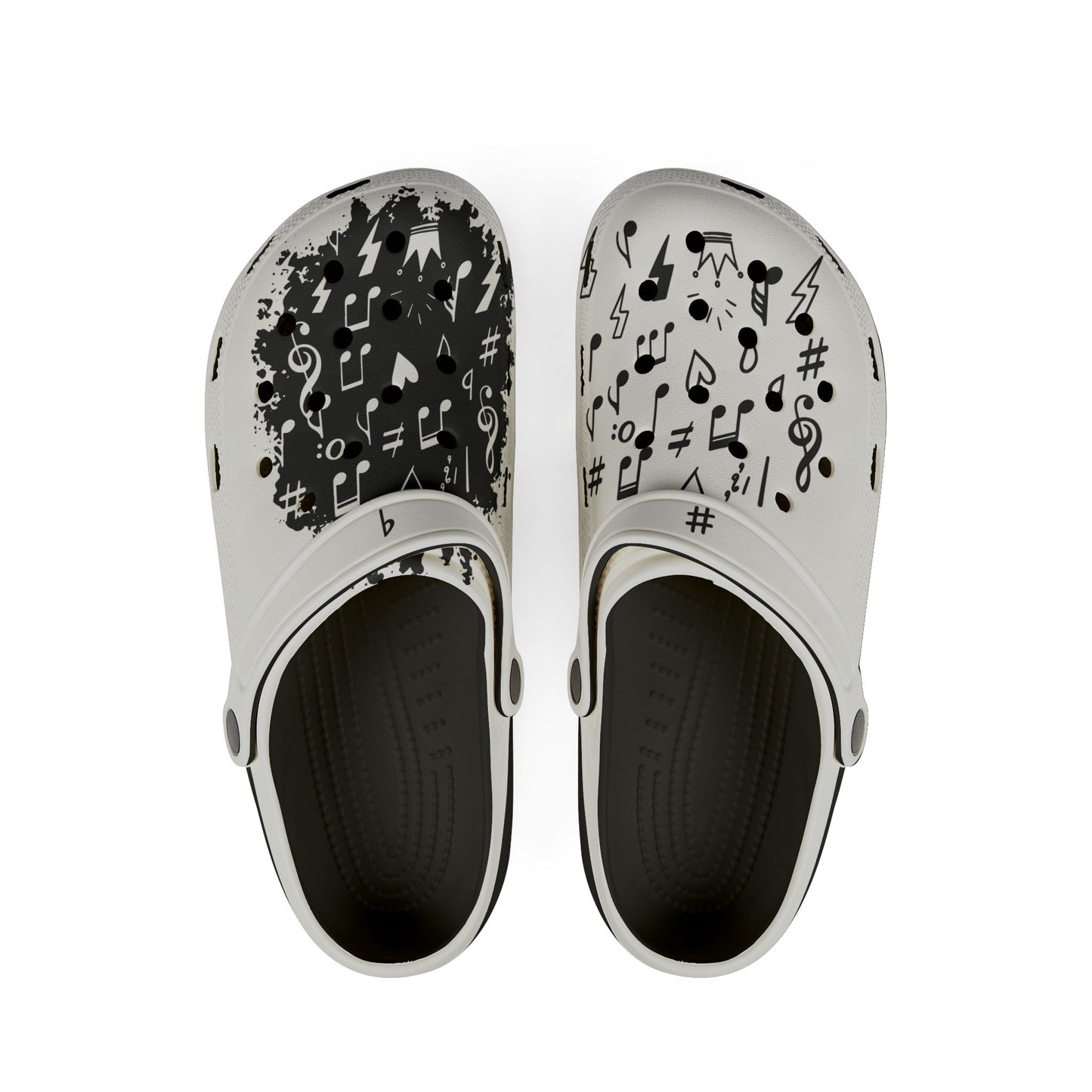 Black-and-white EVA music clogs with black footbeds and contrasting musical note and treble clef artwork.