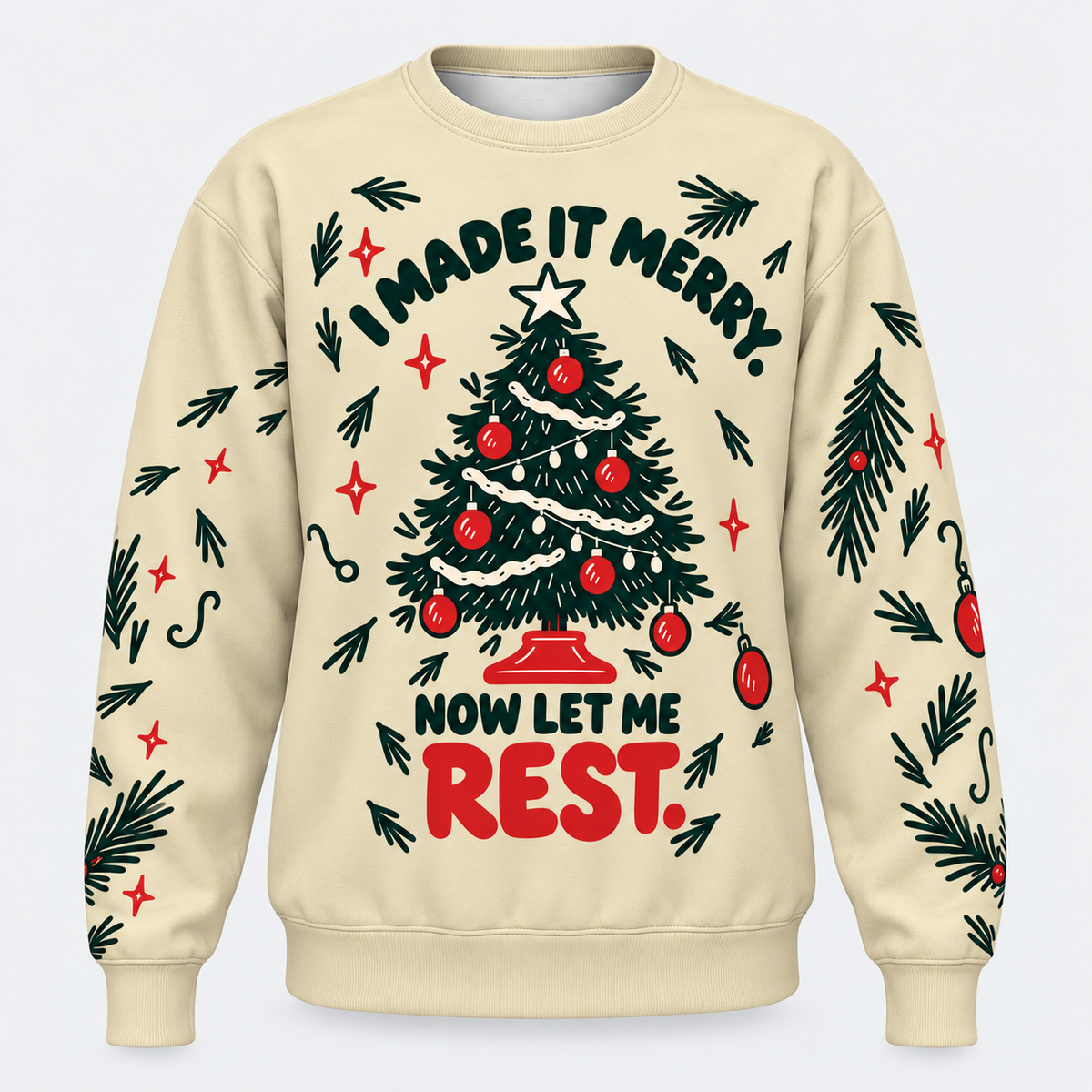 A cream-colored crewneck sweatshirt featuring a festive Christmas tree graphic with the text 'I MADE IT MERRY. NOW LET ME REST.