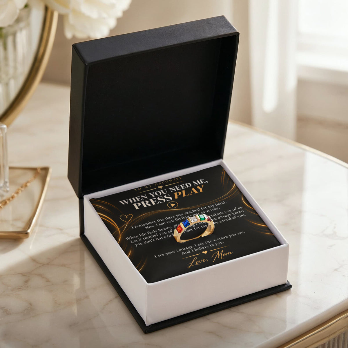 Birthstone ring and To My Daughter Press Play message card presented in an open gift box