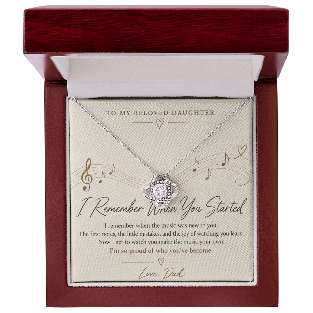 Silver Love Knot necklace for daughter with music-themed message card and mahogany luxury gift box
